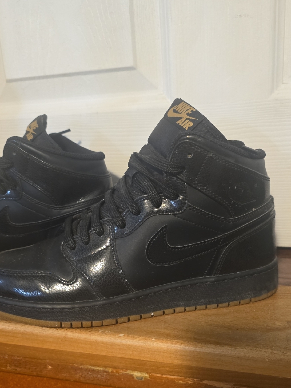 Jordan 1 Black and Gum High-Top Sneakers